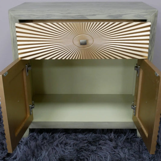 Wooden cabinet with open doors on a textured surface