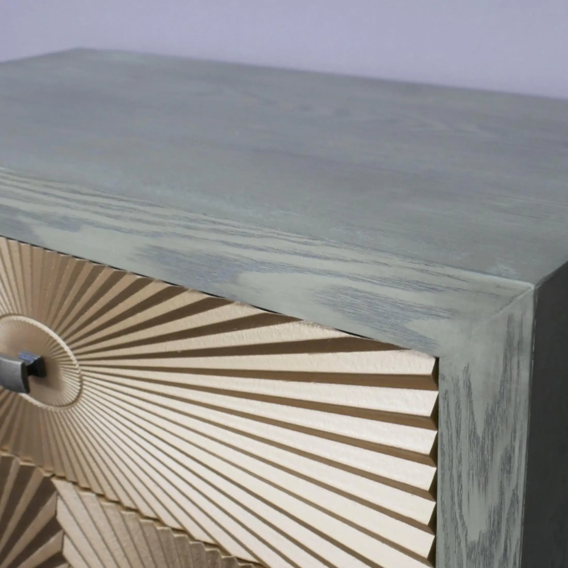 Close-up of a wooden product with a textured surface and circular design.