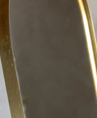 Gold-framed mirror on a white background