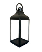 Black metal lantern on a white background