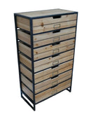 Wooden drawer unit with metal frames against a gray wall.