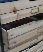 Wooden drawers with metal handles on a wooden cabinet
