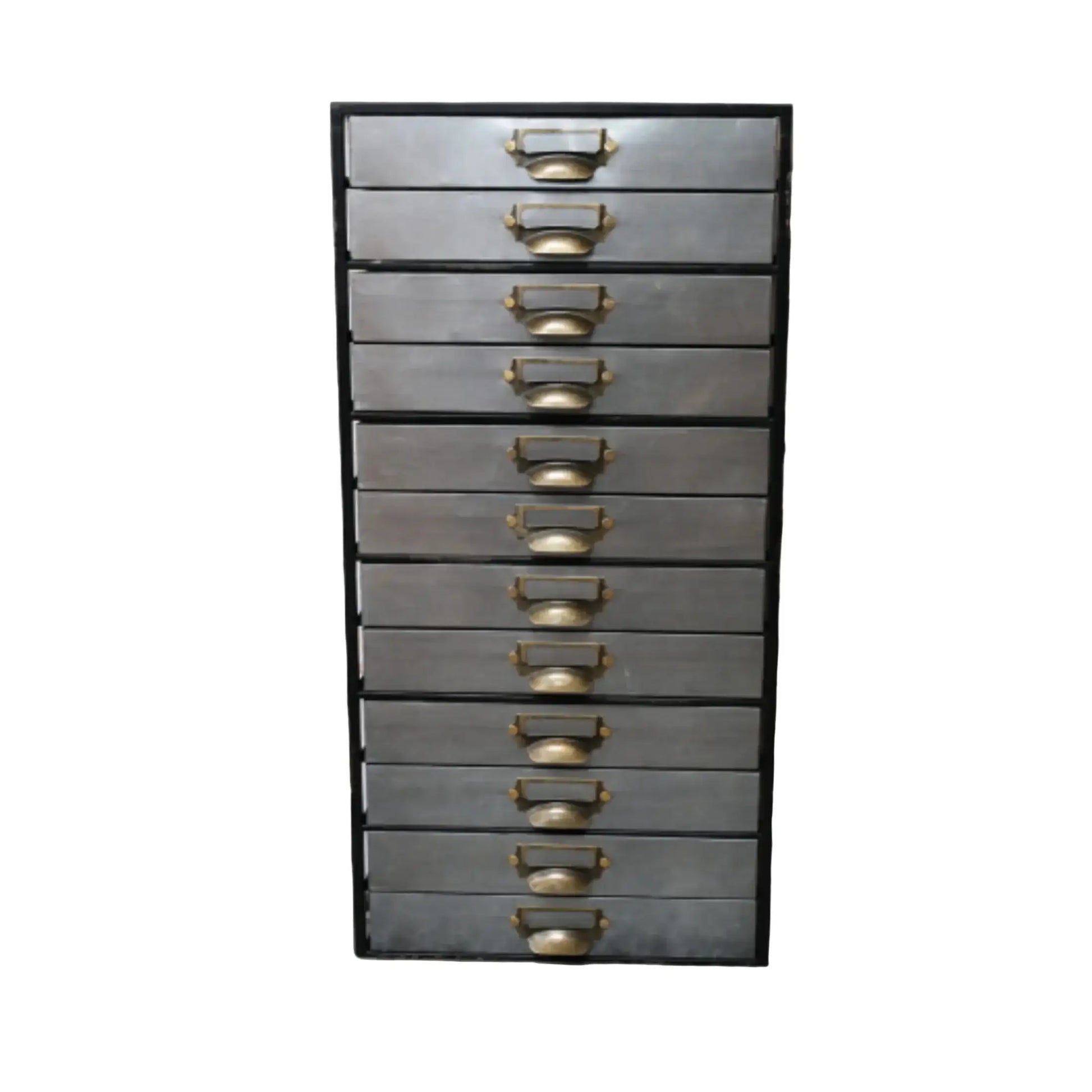 Tall metal drawer unit with brass handles against a brick wall.