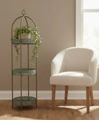 Decorative plant stand with a chair in a room with a window.
