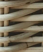 Close-up of a woven wooden basket with slats.