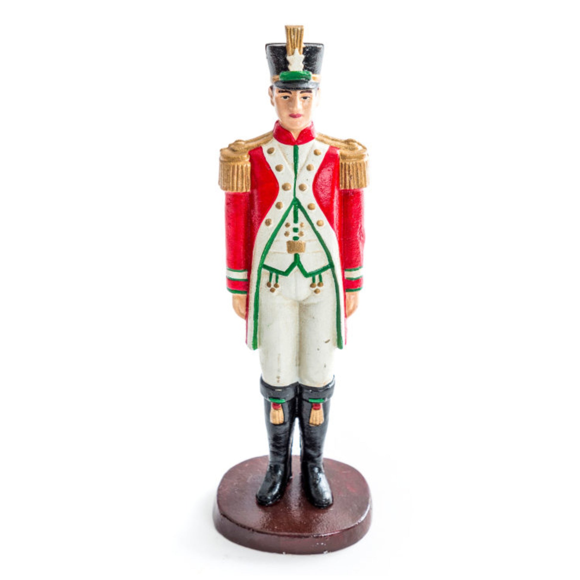 Figurine of a soldier in a red and white uniform on a white background