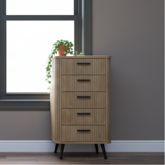 Wooden dresser with multiple drawers against a gray wall with a window.