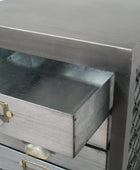 Metallic side table with open drawer and textured surface