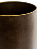 Brown cylindrical vase with gold rim on a white background
