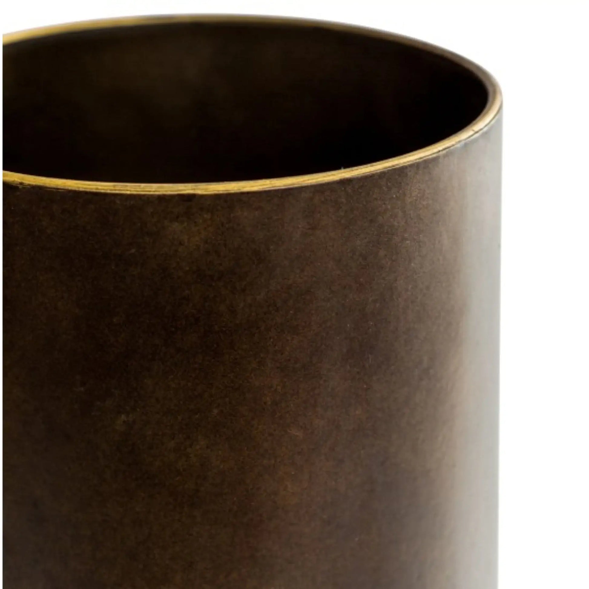Brown cylindrical vase with gold rim on a white background