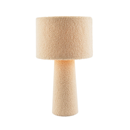 Beige textured table lamp on a white background