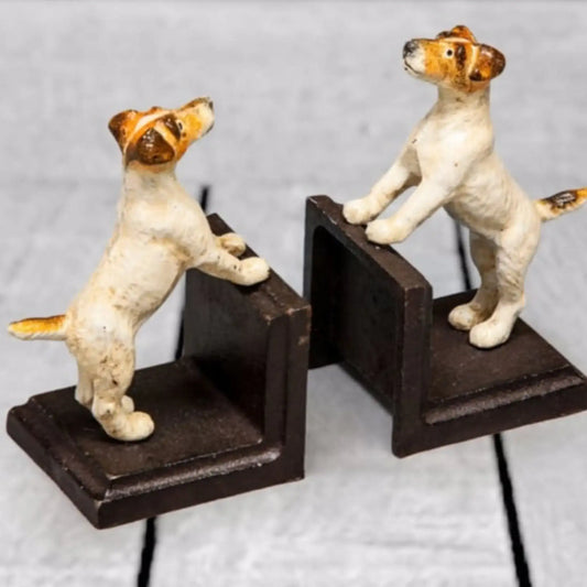 Dog-shaped bookends on a light gray background