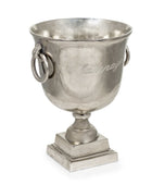 Silver champagne cooler with 'Champagne' engraving on a white background