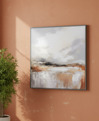 Abstract painting on a wall with a potted plant beside it