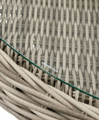 Close-up of a wicker coffee table with a glass top