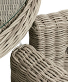 Close-up of woven wicker furniture pieces on a white background