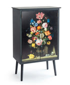 Black cabinet with floral design on a white background