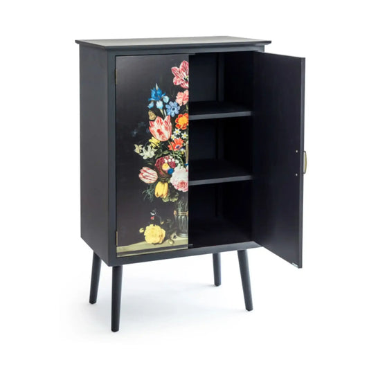 Black cabinet with floral design on a white background