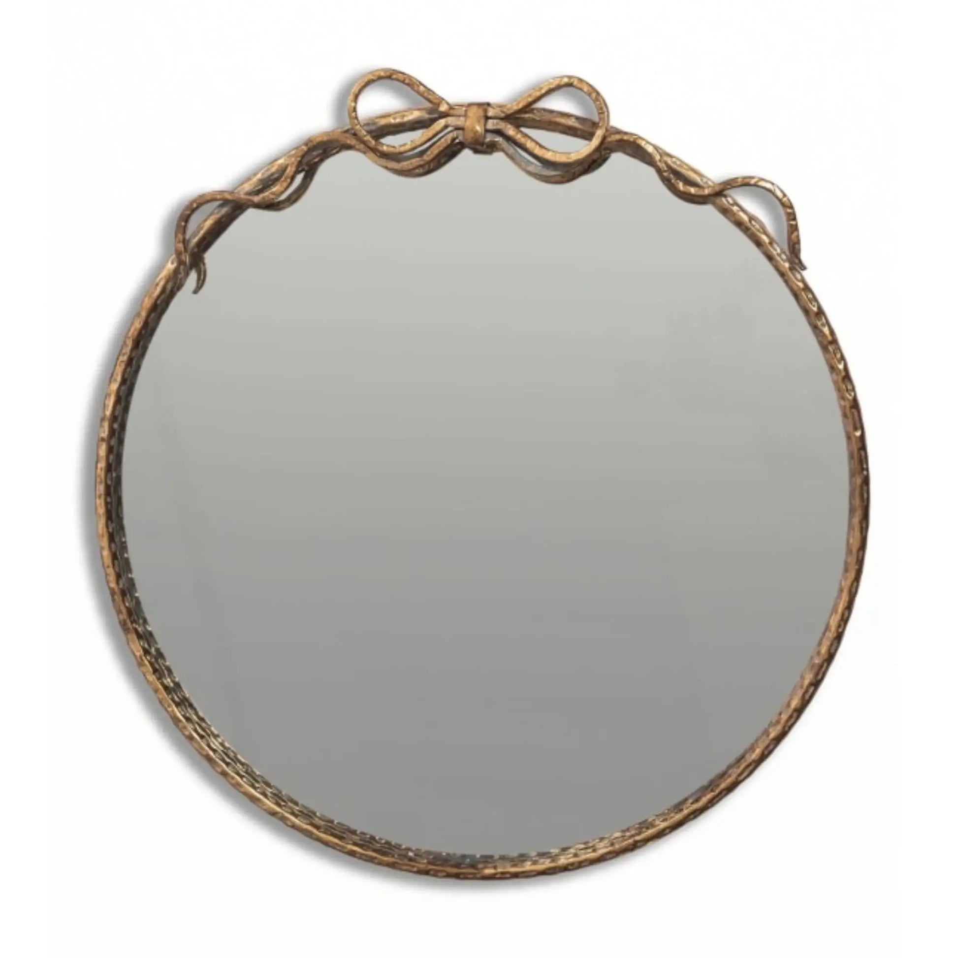 Round mirror with decorative brown frame on a white background