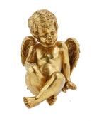 Gold statue of a cherub on a white background
