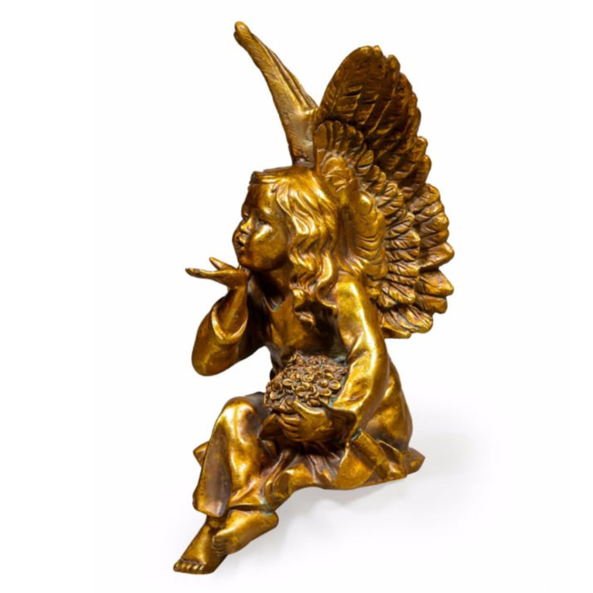 Bronze statue of an angel holding a cornucopia on a white background
