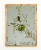 Decorative wall art with birds and a nest on a light background, framed in wood.