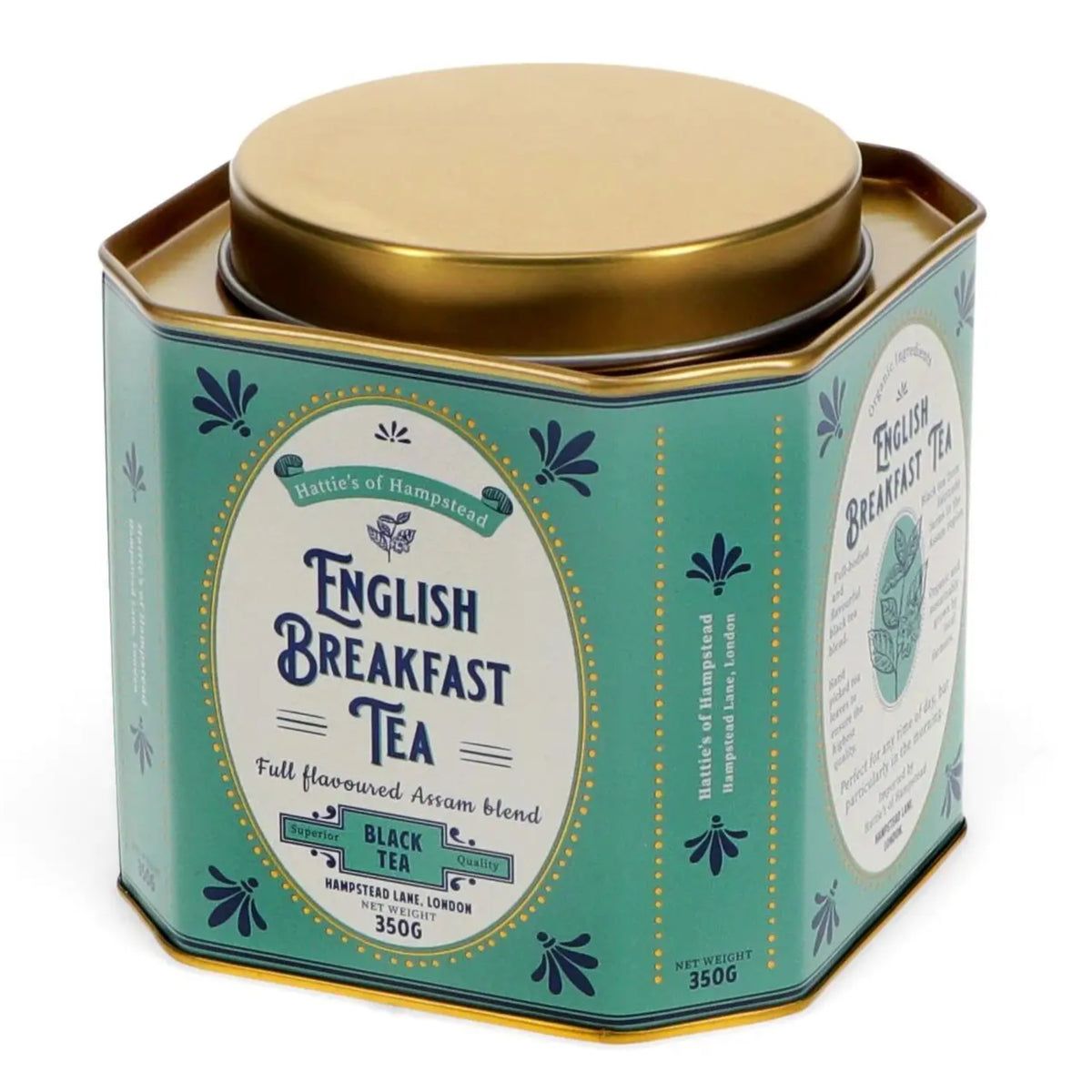 A hexagonal metal tin of English Breakfast Tea from Battle's of Hampstead, featuring a teal-green body with navy blue botanical illustrations, a white central label, and a metallic gold lid.
