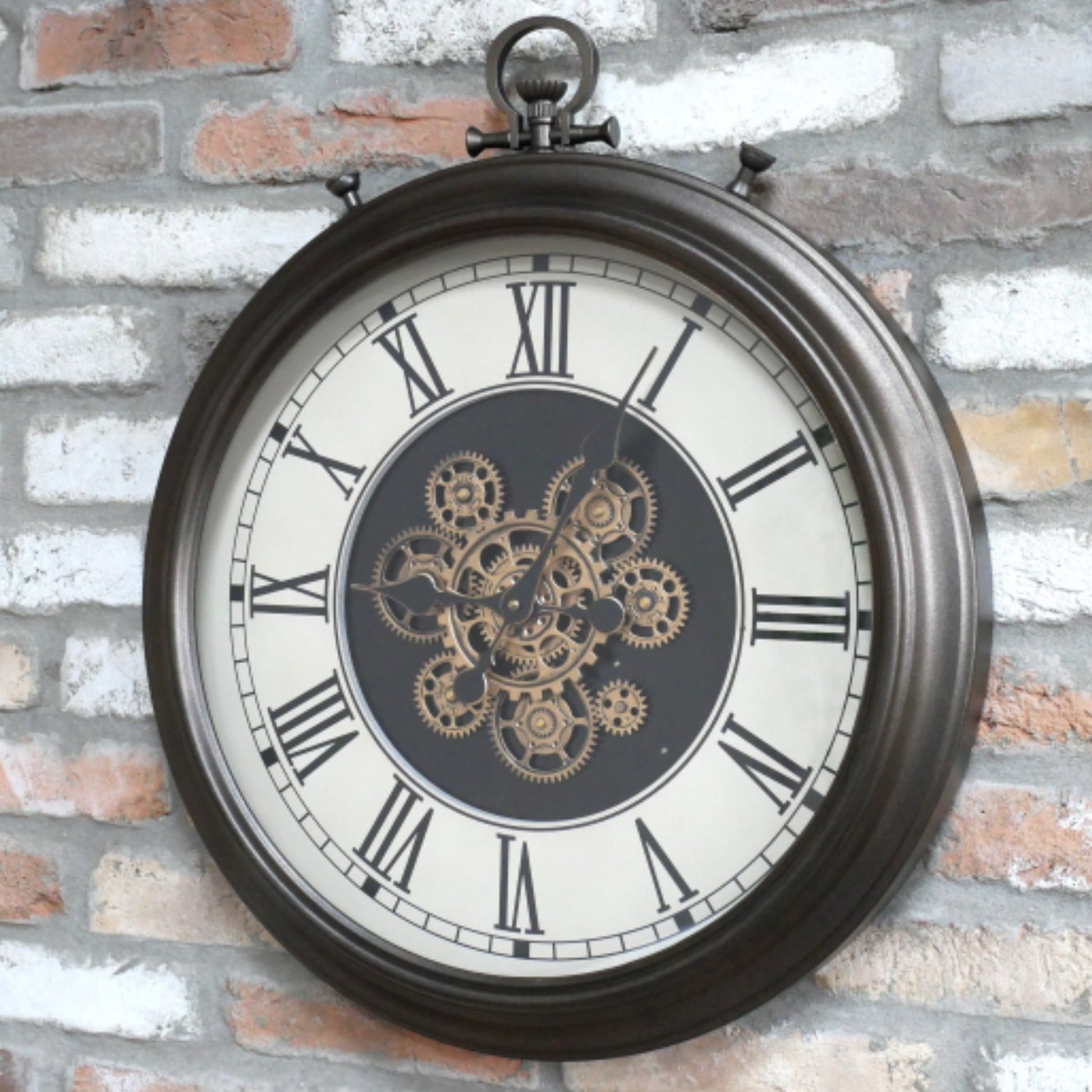 Decorative wall clock with mechanical design on a brick wall