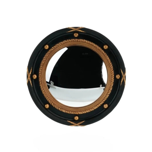 Round mirror with black frame and gold decorative elements on a white background