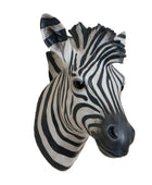 Zebra head sculpture on a white background