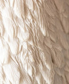 Close-up of beige textured fabric