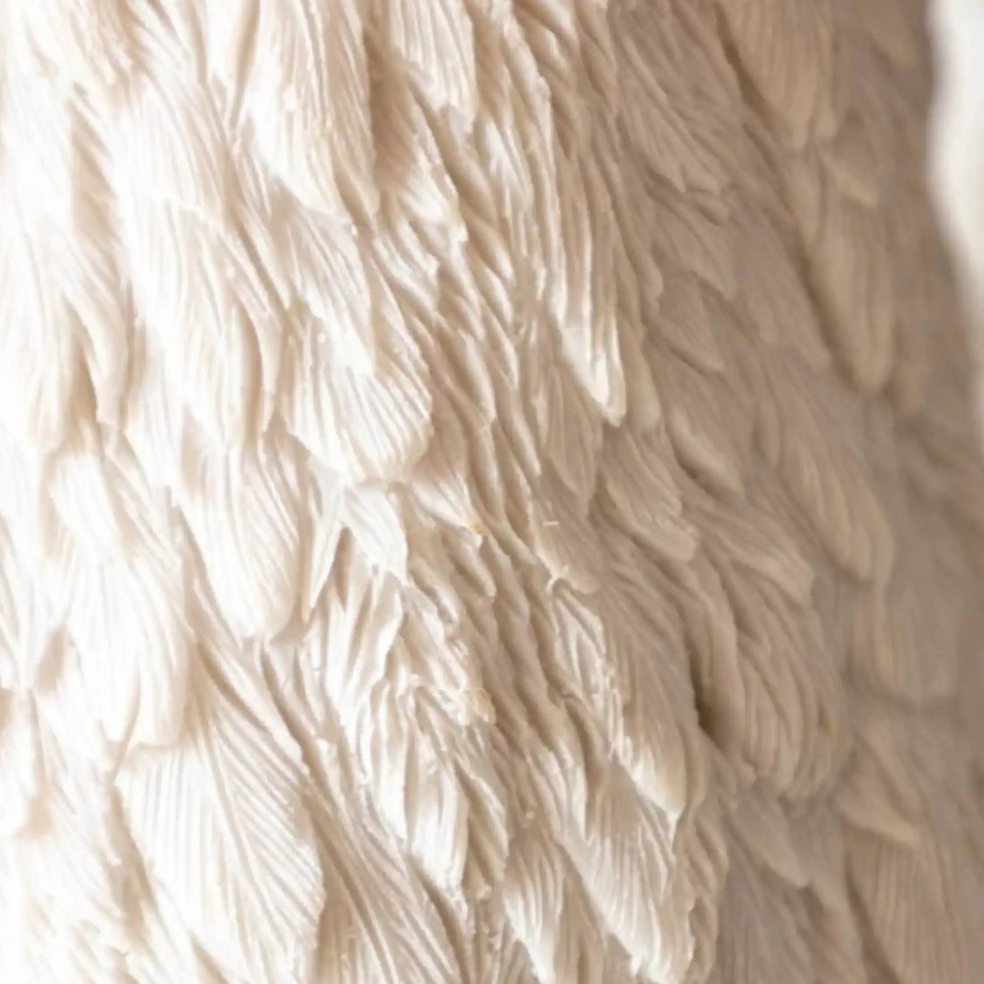 Close-up of beige textured fabric