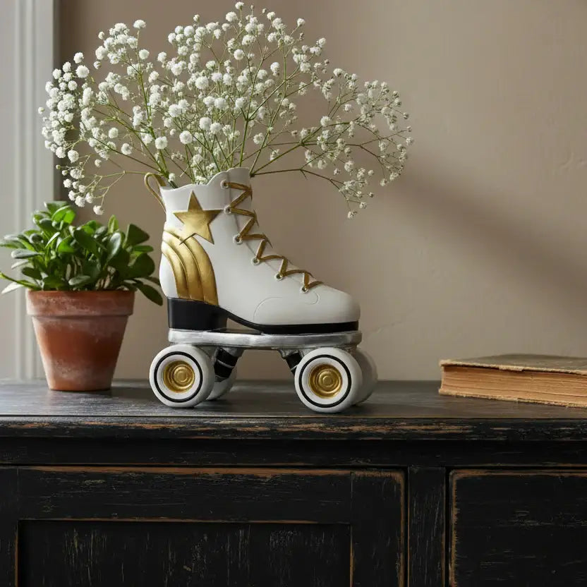 Decorative roller skate with flowers on a wooden surface
