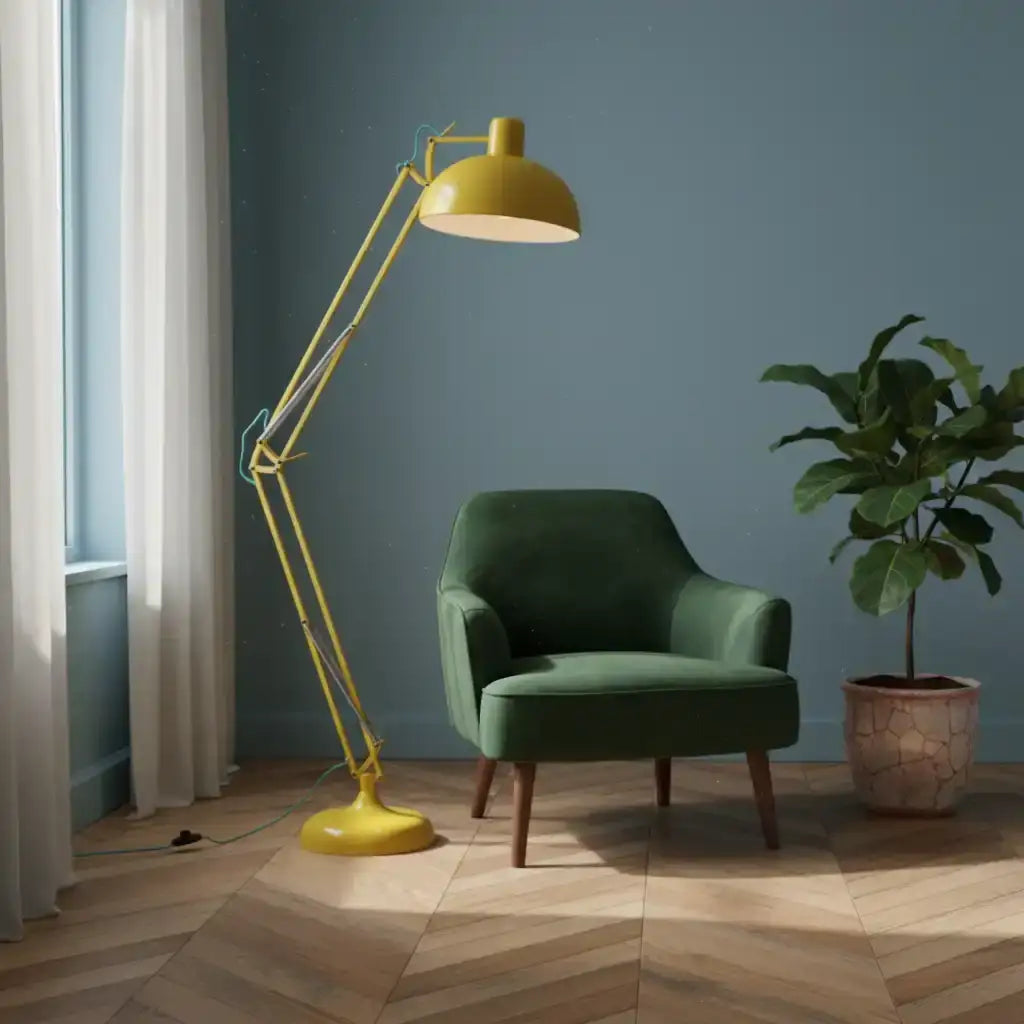 Green armchair with a yellow floor lamp in a room with a plant and window.