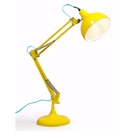 Yellow desk lamp with a long arm on a white background