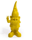 Yellow garden gnome making a peace sign on a white background