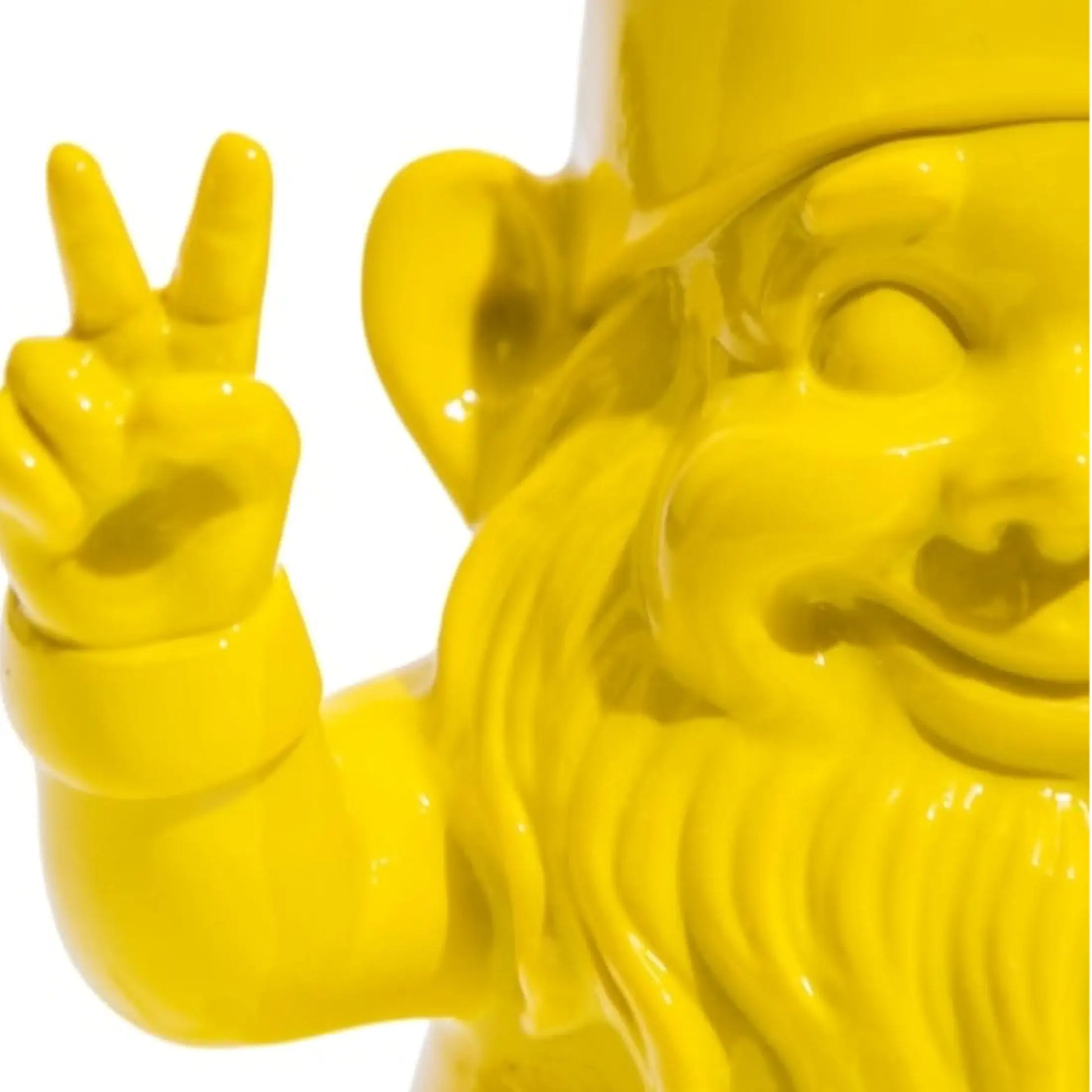Yellow gnome making a peace sign with a white background