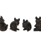 Four small bronze mouse figurines on a white background