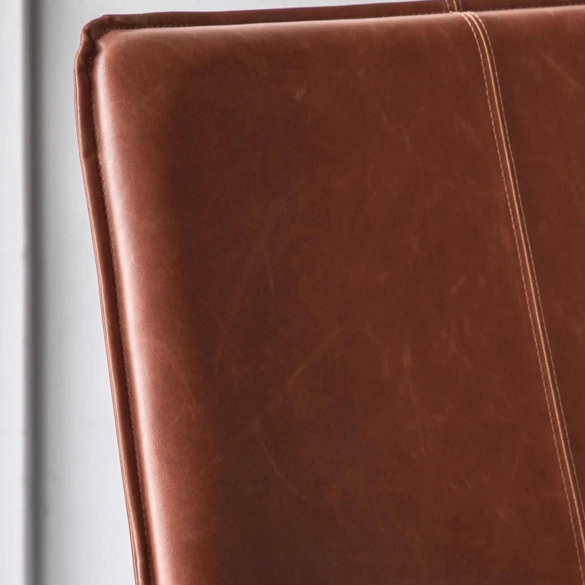 Brown Curved Seat Faux Leather Chair - The Farthing