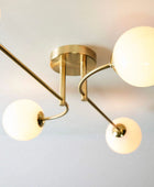 Brushed Brass Art Deco Inspired Four Globe Ceiling Light - The Farthing