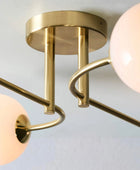 Brushed Brass Art Deco Inspired Four Globe Ceiling Light - The Farthing