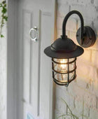 Coastal Matt Black Exterior Cage Wall Light - The Farthing