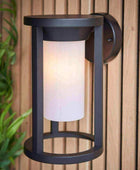 Exterior Black Cylinder Downlighting Wall Light - The Farthing