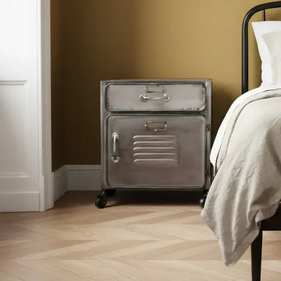 Metal nightstand with two drawers in a bedroom setting