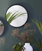 Matt Black Round Metal Wall Mirror - The Farthing