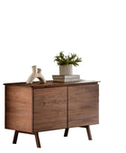 Wooden sideboard with decorative items on a white background