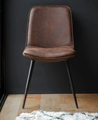  of Two Aged Faux Brown Leather Dining Chairs