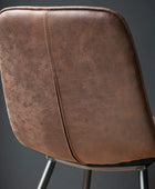  of Two Aged Faux Brown Leather Dining Chairs 55