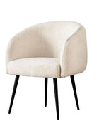 Beige armchair with black legs on a white background