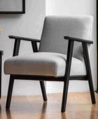 Relaxed Soft Grey Linen and Black Wood Armchair - The Farthing